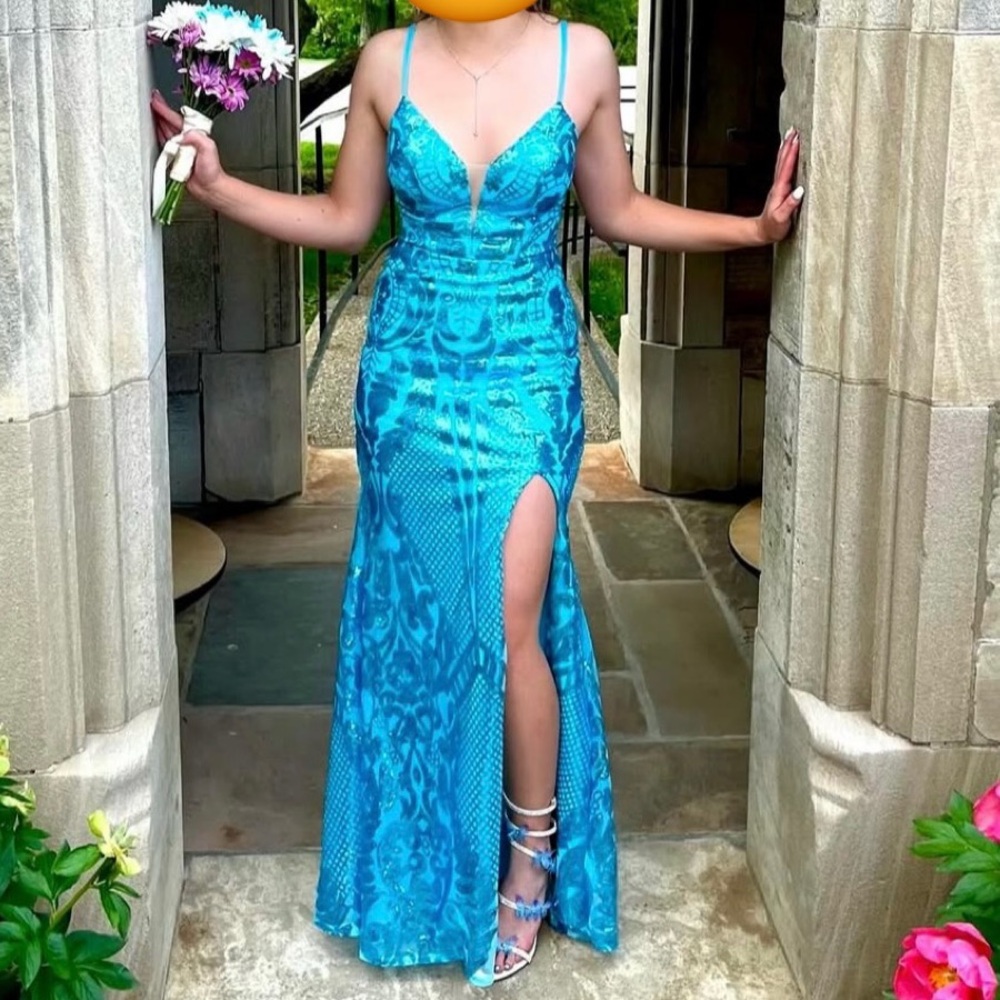 Elegant Blue Sequin Evening Gown with Strappy Back